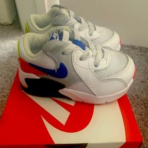 5c Nike AirMax SC *gently used* white, black, blue, red, like green on the back.